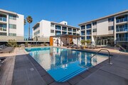 Poolside view - Dolphin Marina Apartments