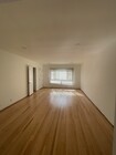 Large living room with solid oak hardwood and recess lighting - 10513 Crenshaw Blvd Unit 10513 Crenshaw Blvd #1