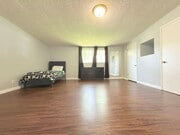Photo - 4-Bedroom Home with Expansive Backyard in ...