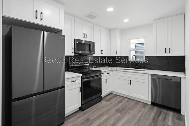 Building Photo - 6644 Rockglen Ave Unit 6634