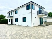 Photo - Newly built gated home with top of the lin...
