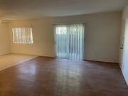 Living Room - 11712 Kiowa Ave Apartments