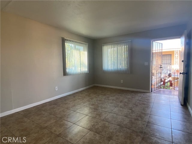 Building Photo - 1023 W 8th St Unit C