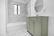 fully remodeled bathroom - 1185 S Tremaine Ave Unit 1185 TREMAINE AVE