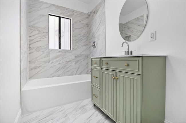 fully remodeled bathroom - 1185 S Tremaine Ave Unit 1185 TREMAINE AVE