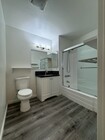 master bathroom. both shower and tub. new countertops, plumbing fixtures - 1757 17th St Apartments Unit #3