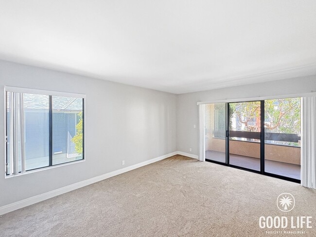 Photo - Light-Filled 2BD/2BA Top-Floor Condo in Mira Mesa with Granite Kitchen, Private Balcony & Pool