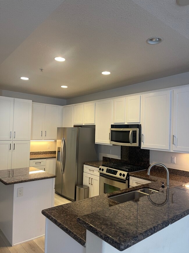 Includes refrigerator - 12664 Chapman Ave Condo Unit Chapman Commons