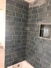 Upgrading bathroom with new tile and shower enclosure - 5727 S Corning Ave Unit 5727