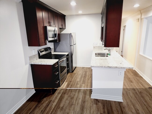 Building Photo - 13655 Ruette Le Parc Unit 13655