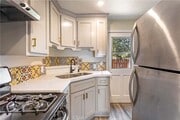 Open Kitchen with Fixtures - 1005 1/2 Calzona St Apartments Unit 1005 1 2