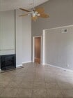 Vaulted ceiling and recess lighting in your bright living room. - 18681 Maplewood Cir Condo Unit 18681 Maplewood Circle