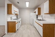 2BR, 2BA - 1,020SF - Kitchen - Canyon Creek Apartments