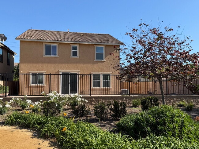 Photo - New flooring & paint!  Large backyard - landscaped and ready for garden!   Community pool, fitnes...