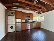 Photo - Spacious One Bedroom + Den Backhouse! In Unit Laundry! Prime Location!