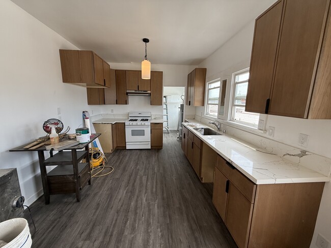 Photo - 212 1/2 W 57th St Unit 212 upper