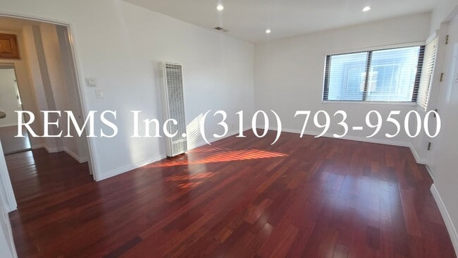 Photo - Refurbished Upstairs Apartment with Garage parking Unit 9034