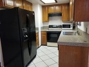 Kitchen with Granite Counters - 200 Elm Ave Unit #7