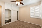 bedroom with plantation shutters - 1317 19th St Apartment Unit C
