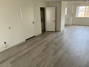 Laundry Closet next to entry in to Livingroom - Beneda Lane Apartments