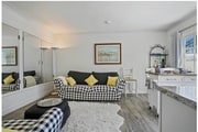 Living Room/mirrored closets - 8966 Shoreham Dr Unit Luxe Feel-Poolside Apt