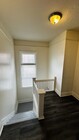 Top of Stairway - 143 E 10th St Apartments Unit 143