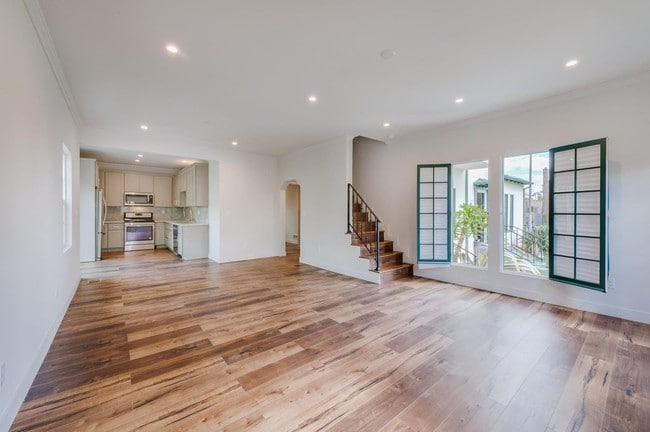 Open floor plan from living room to kitchen - 5257 S San Vicente Blvd Townhome