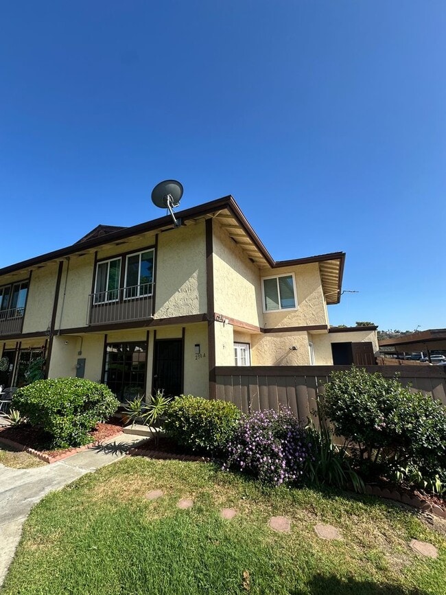 Photo - Spacious 3BR/2.5BA updated 2-story townhouse for rent with fenced patio, 2 parking spaces and more Unit A