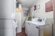 Laundry Room - Del Amo Place Apartments Homes