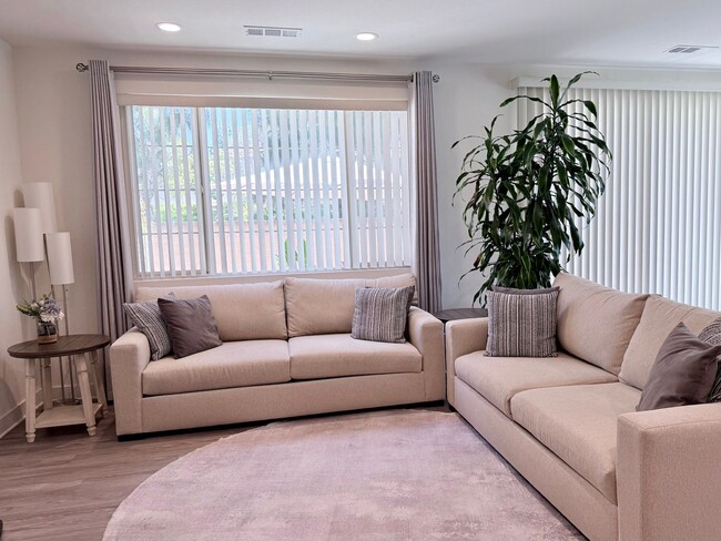 Photo - Stunning 3-Bed/2.5-Bath End Unit Condo with Solar & Large Yard