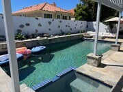 Photo - Coastal Elegance Meets Family Comfort in D... House
