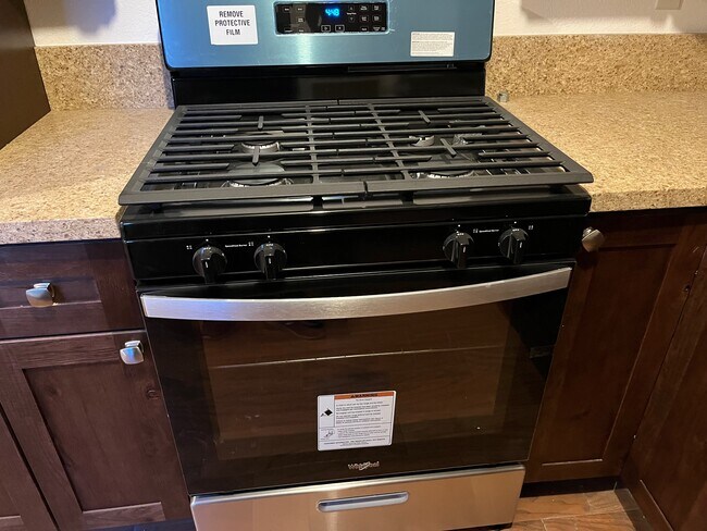 Brand new stainless steel stove - 2458 S Normandie Ave