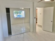 Bedroom one - spacious closet - The Junipero Palm Springs Apartments