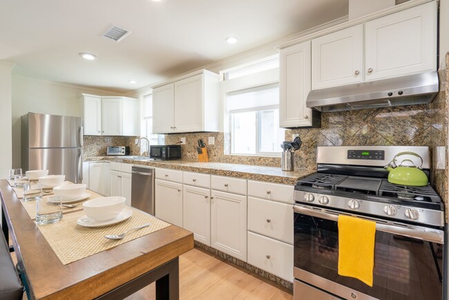 Photo - Enjoy stunning sunsets and beach living at...