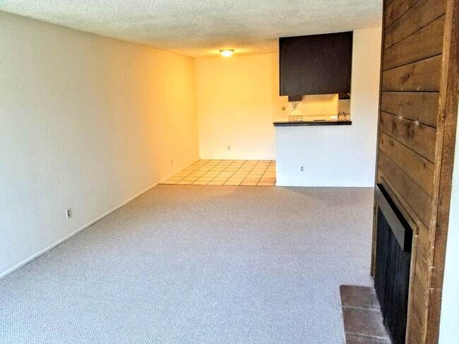 view from living room toward dining area and kitchen. - 3717 Cardiff Ave