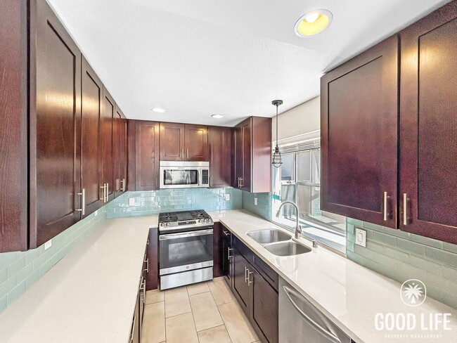 Photo - Beautiful 3B/2BA condo with Washer/Dryer & Large Backyard in Midway District! Unit 2