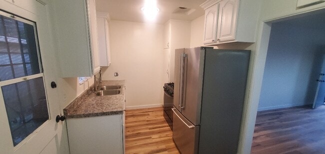 Building Photo - 1345 W 163rd St Unit B