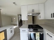 kitchen with all new appliances - 1225 N Broadway Townhome