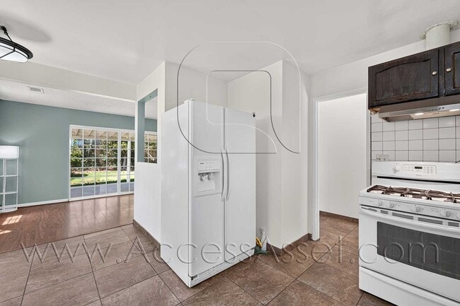 Photo - Charming 4 Bedroom Home with Private Yard & Garage Parking
