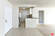 Entry and kitchen - 7742 Redlands St Condo Unit D3047