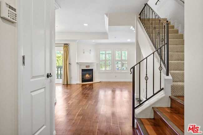 Building Photo - 1050 N Edinburgh Ave Unit 303