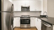 Kitchen with Stainless Steel Appliances - Belle Fontaine