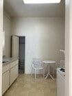 Full Kitchen with closet. - 129 S Irena Ave Apartments Unit A Bachelor
