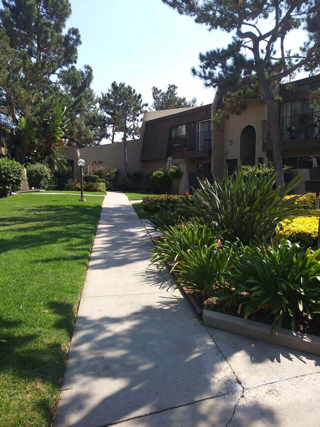 Gorgous walkways between buildings and apartments at Teton Pines Apartments in Escondido, California. - Teton Pines Apartments