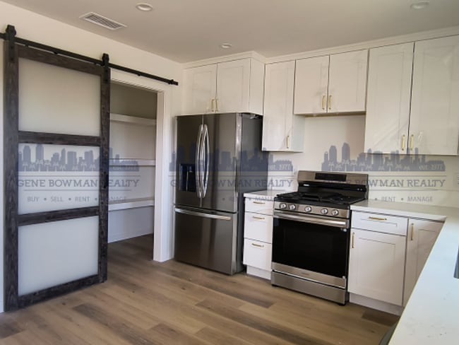 Building Photo - 2201-2205 E 24th St Unit 2205 E 24th St