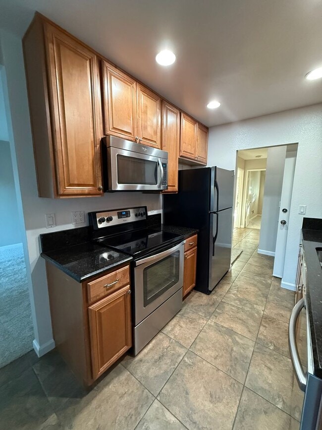 Photo - Excellent 2 bedroom 2 bathroom single story condo with private backyard. Unit 19