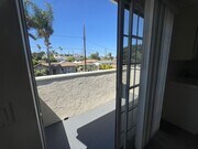Photo - $2,395! Spacious Upstairs 2 Bedroom, 2 Bathroom Apartment with 2-Car Garage! 90710 Unit Apt 2