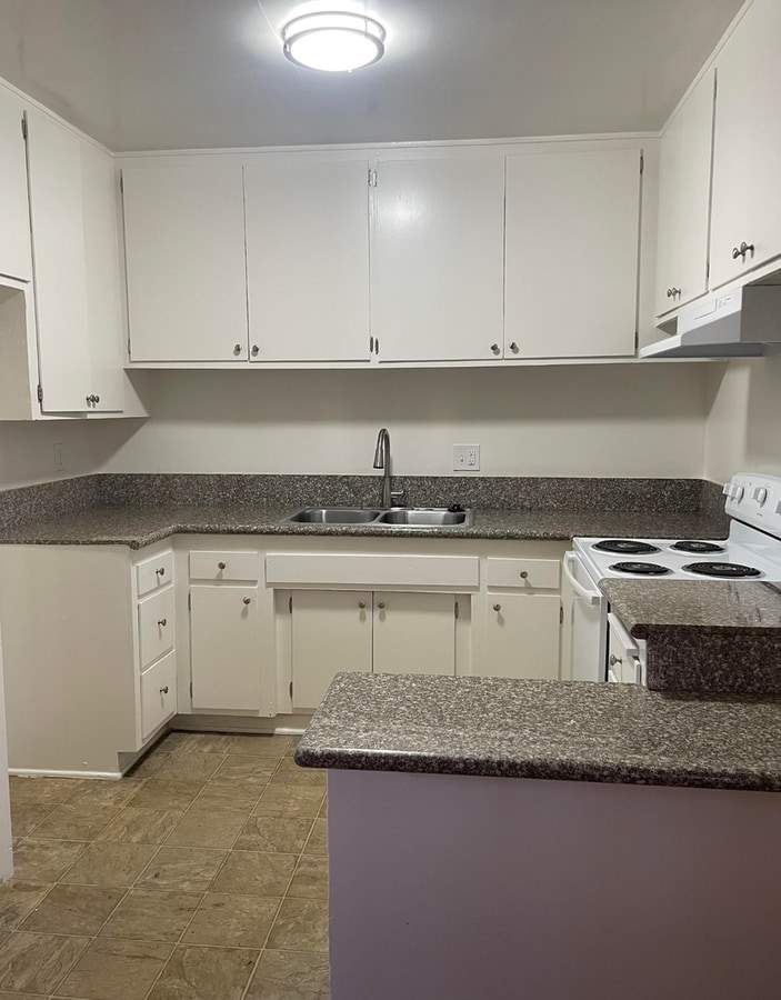 Photo - Cozy 1 bedroom unit located in Canoga Park with Laundry On-site and Community Pool! Unit 205