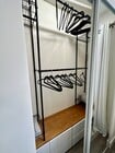 Built-in closet organization system. - 3038 E St Apartments Unit E