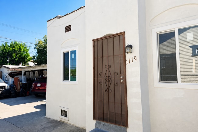 Building Photo - 1117-1119 W. 58th Pl.